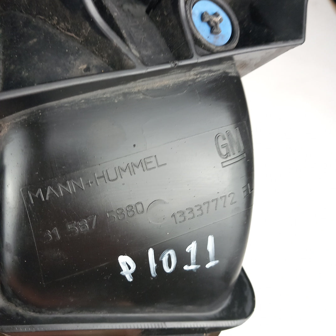 13337772